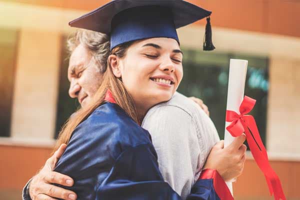 Parent reviewing college options with their student
